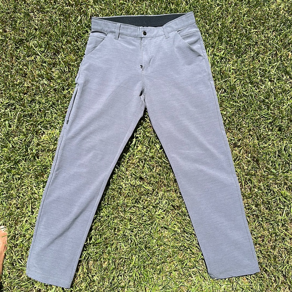 One pair of BYLT Kinetic pants in iron color.